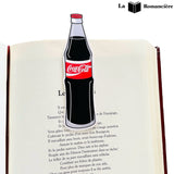 marque page pour enfants soda coca cola sur une page d'un livre ouvert