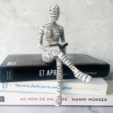 statuette lecteur